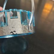 glass and hammered metal pocket emptier