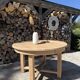 Round solid oak table with extensions, maximum 220cm.
