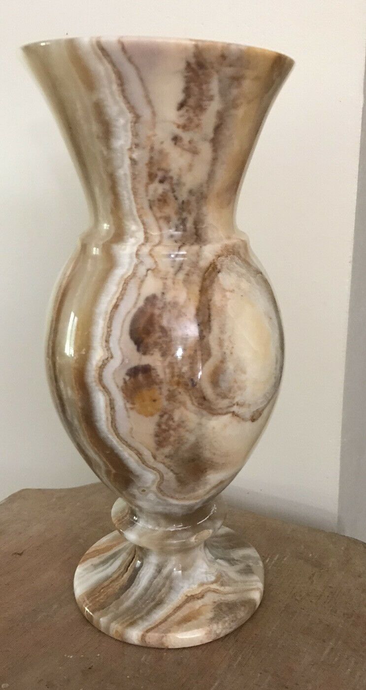 Vintage vase in marbled onyx stone shades of beige and brown