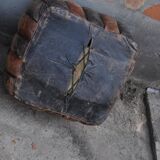 Set of 2 vintage ottomans in brown and black leather with Egyptian patterns from the 1970s.