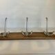 Old coat rack wood metal three hooks