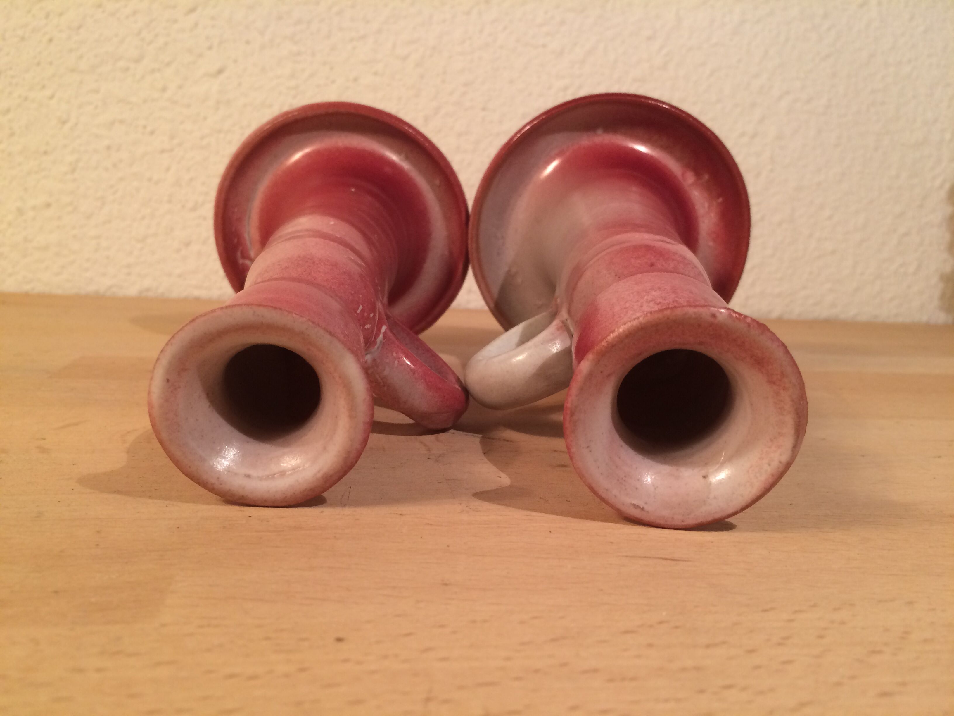 Pair of pink ceramic candle holders