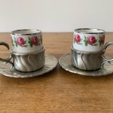 2 small porcelain cups and their pewter cup holders