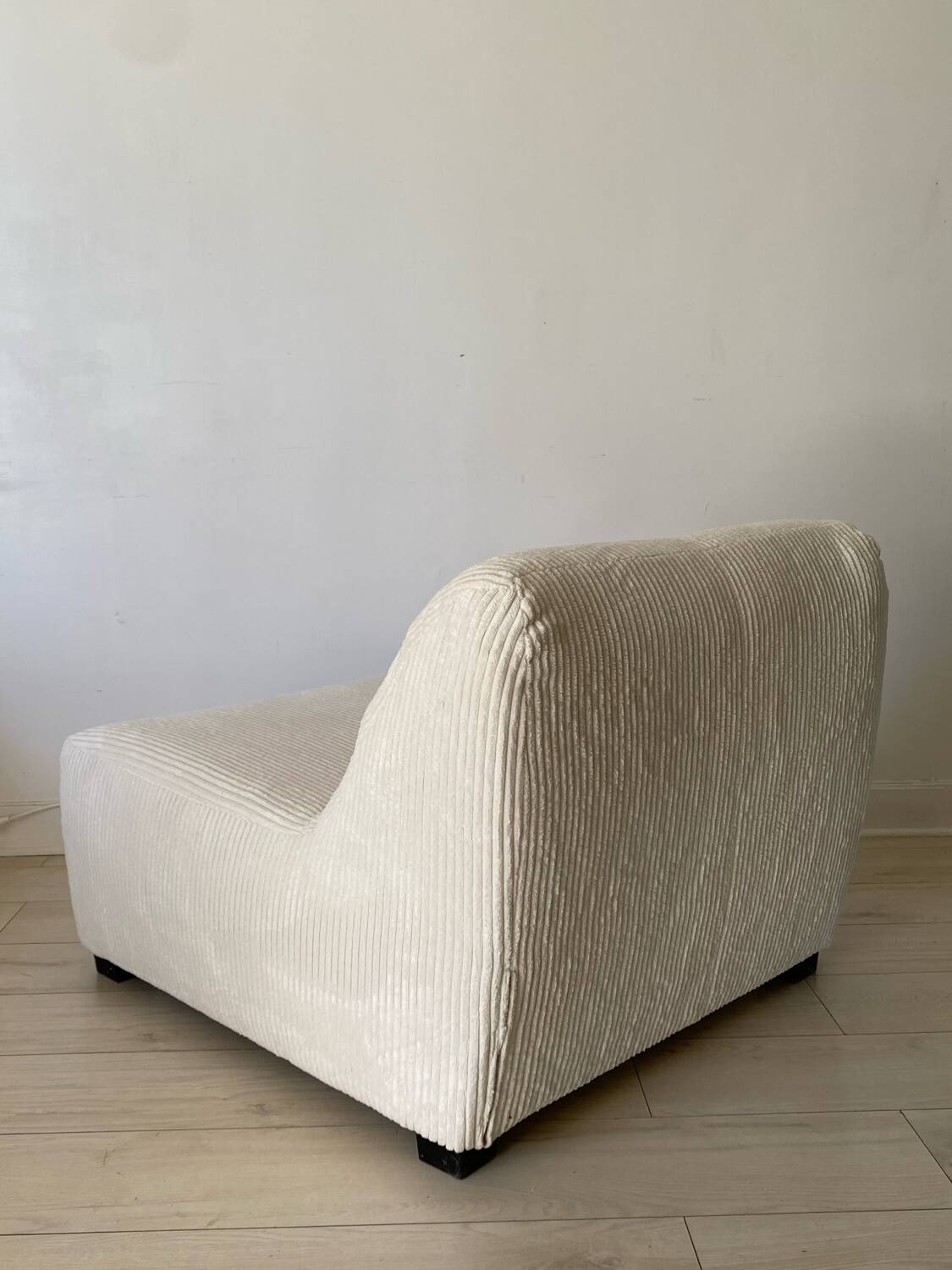 White corduroy armchair