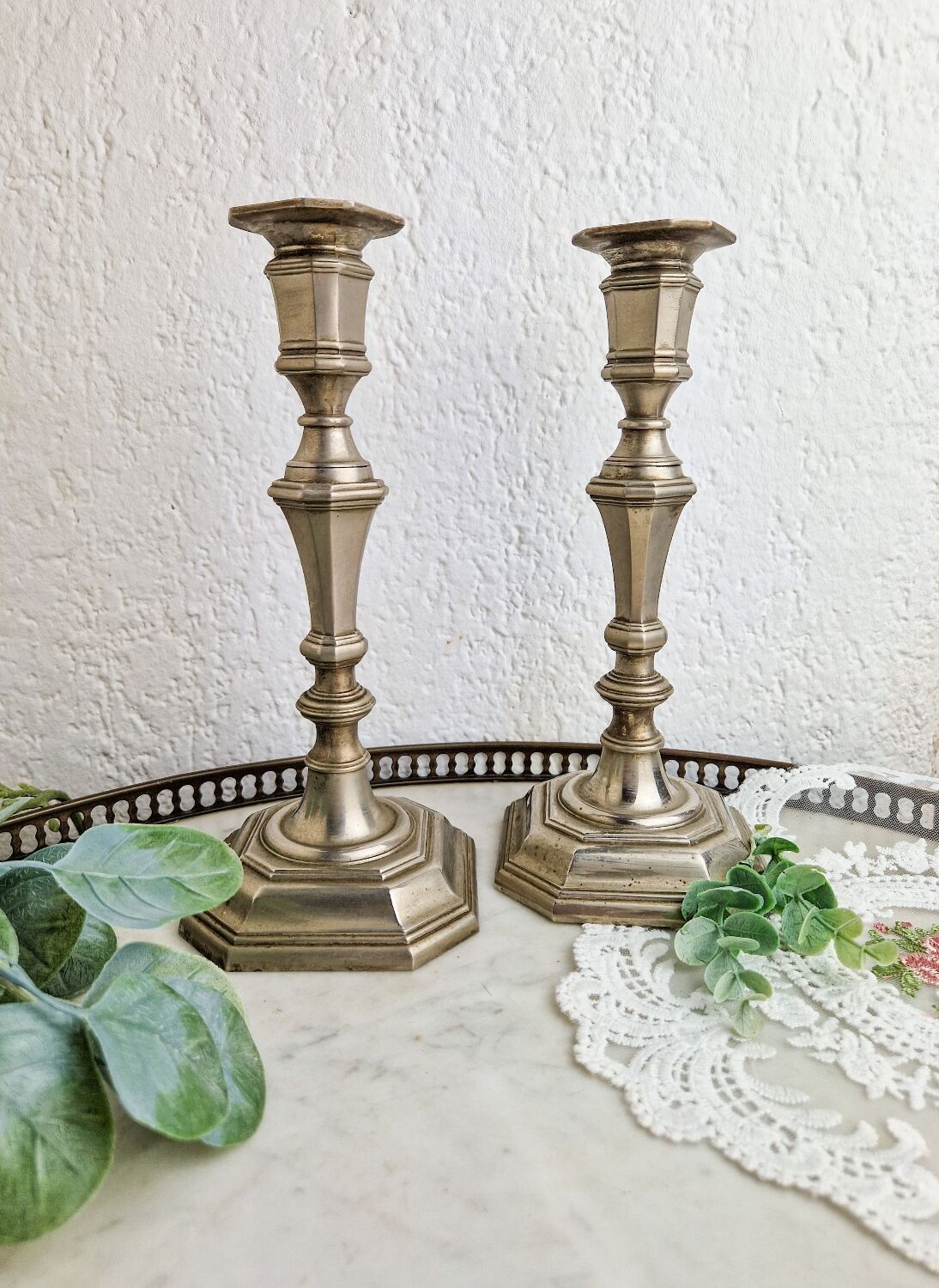Pair of neo classical style candle holders in silver metal