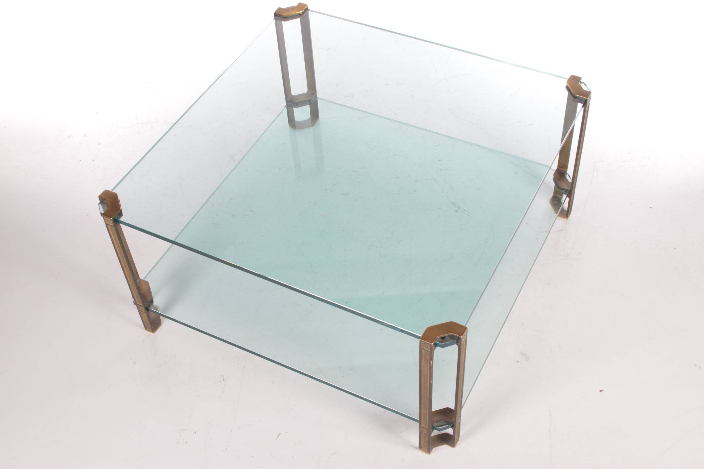Peter Ghyczy T24D coffee table with brass legs and glass top