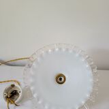 Serrated opaline suspension