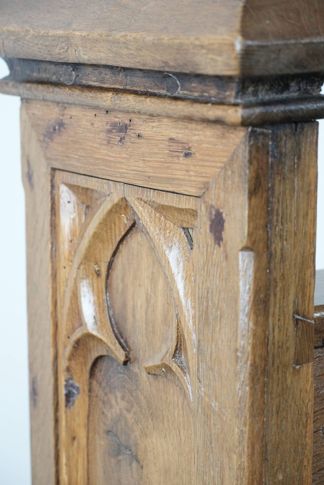 Antique oak church bench in Gothic style with beautiful wood carving