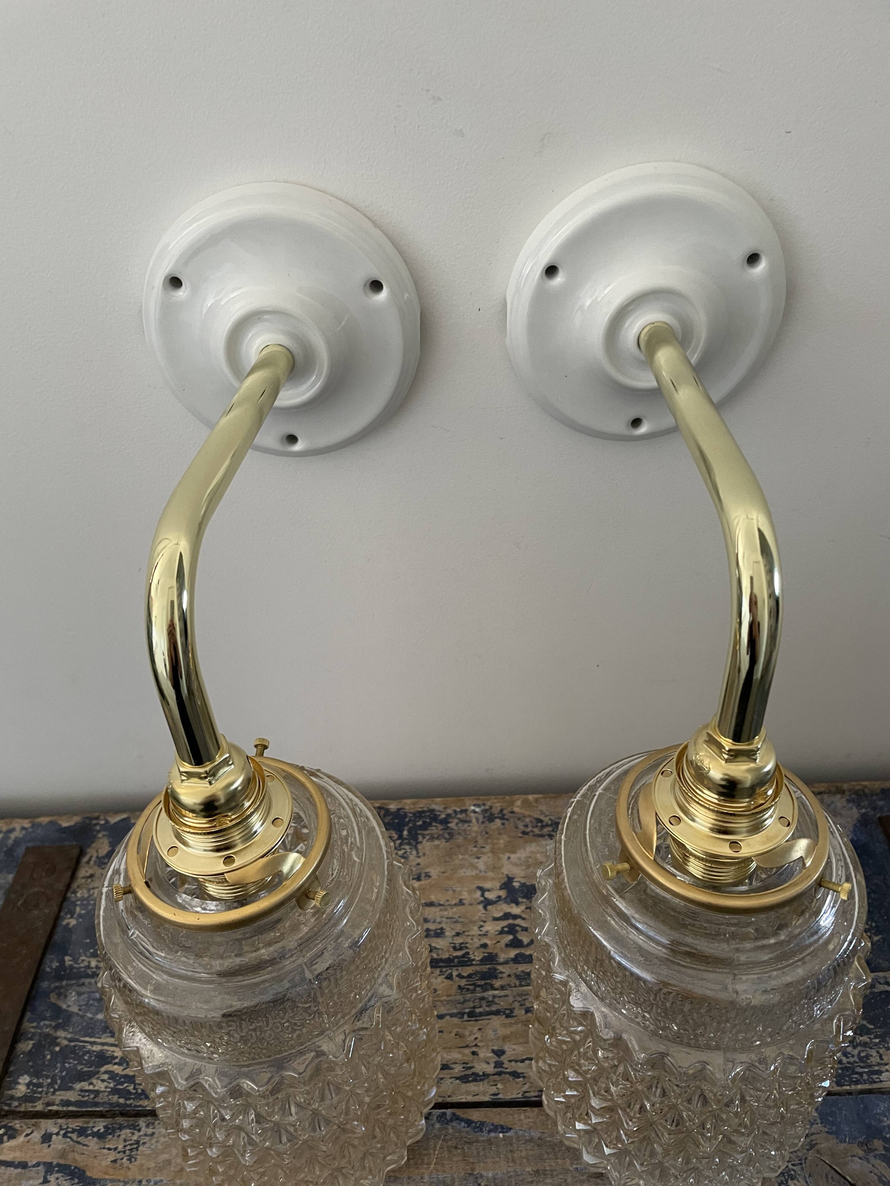 Pair of vintage electrified glass wall lamps