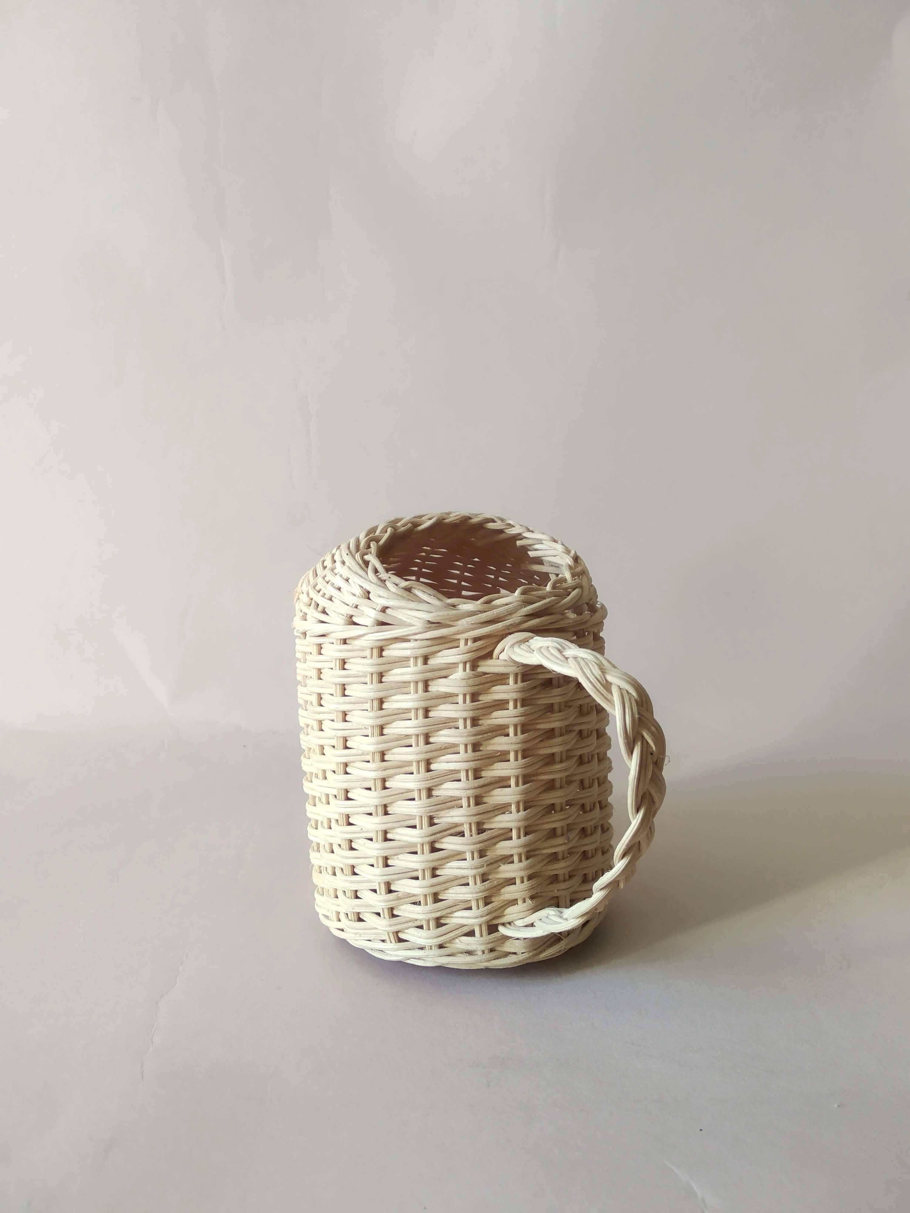 Miniature rattan watering can