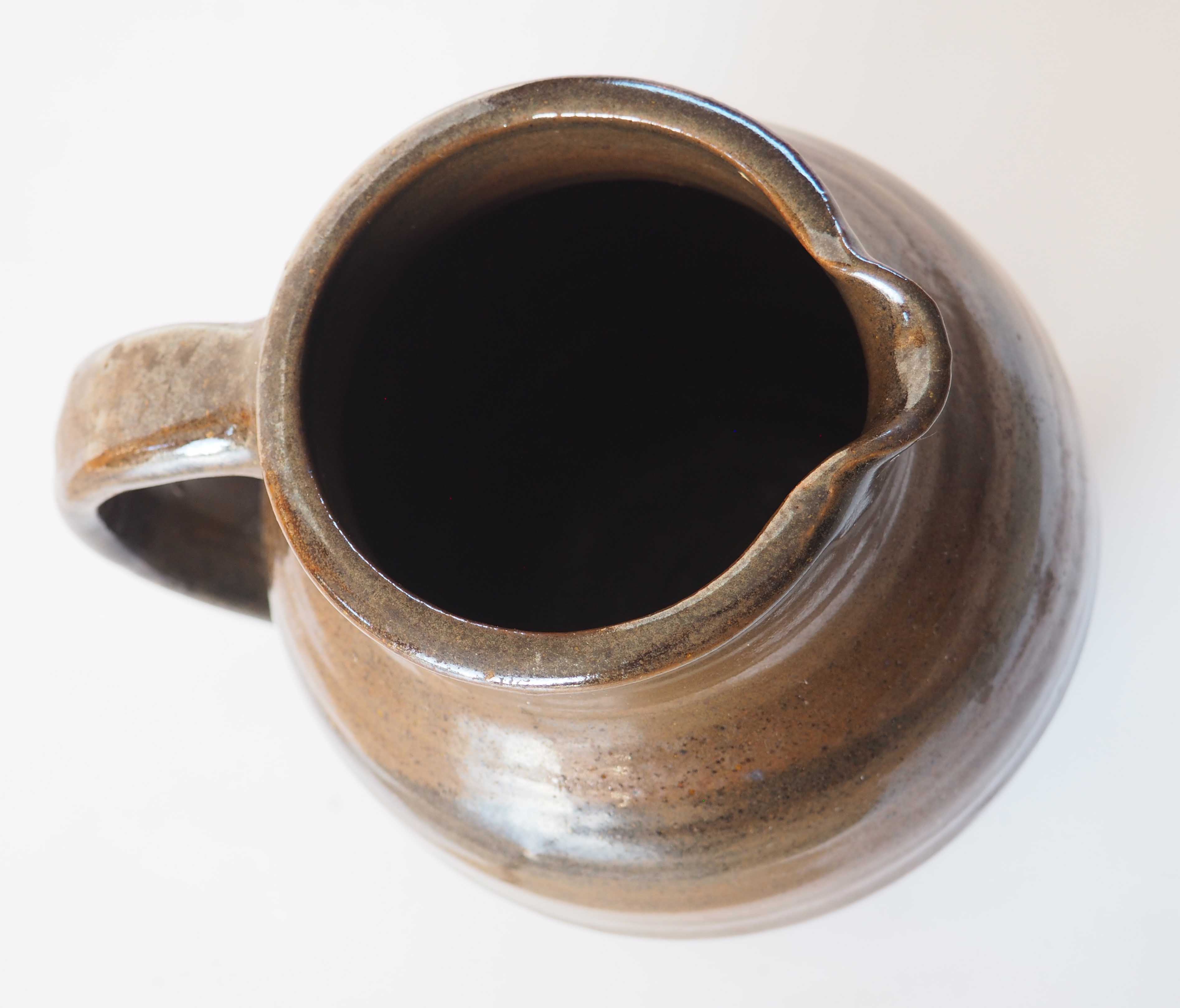 Duo of sandstone pitchers