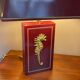 Pair of table lamps in Bordeaux lacquered wood and brass seahorse