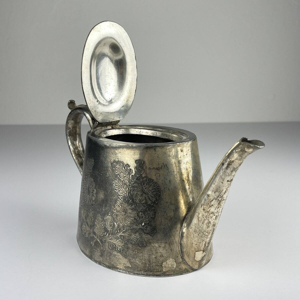 Antique silver-plated teapot from Sheffield, England, 1890-1910.