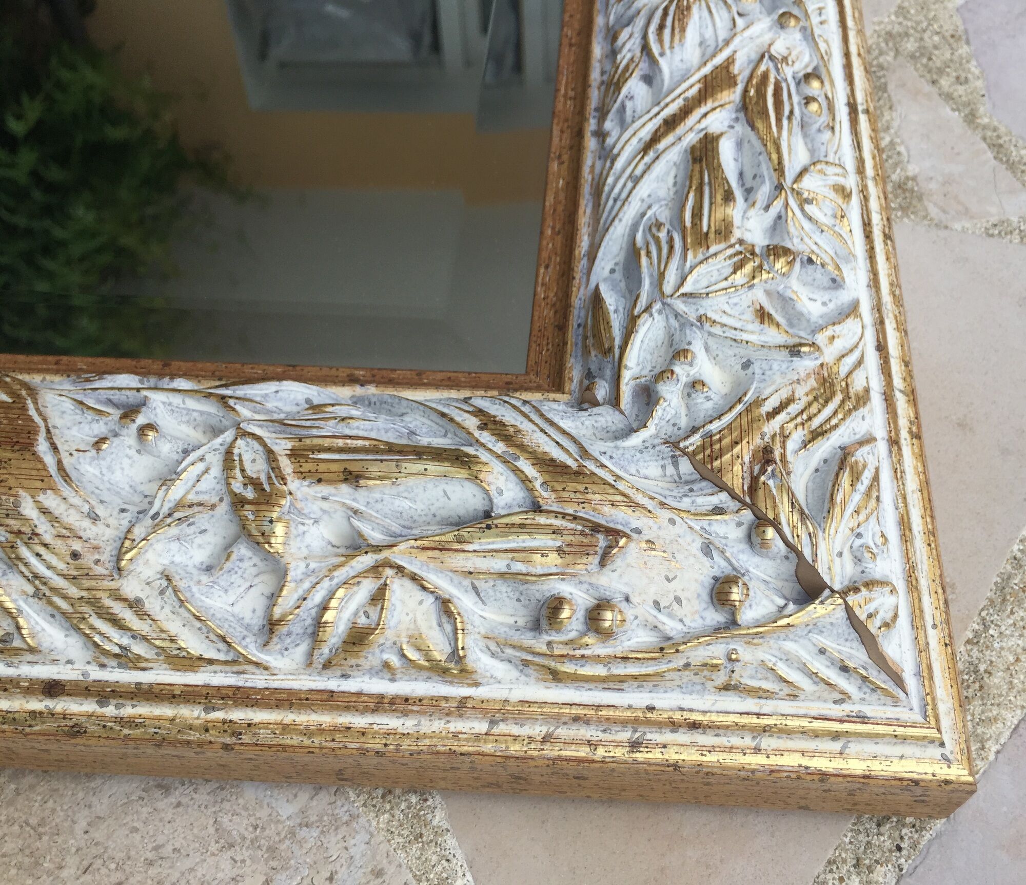 Pair of bevelled mirrors in white and gilded wood 86 x 66 cm