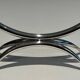 Silver-plated metal and plexiglass design candlestick.