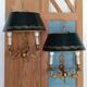 Pair of bronze and sheet metal hot water bottle wall lights