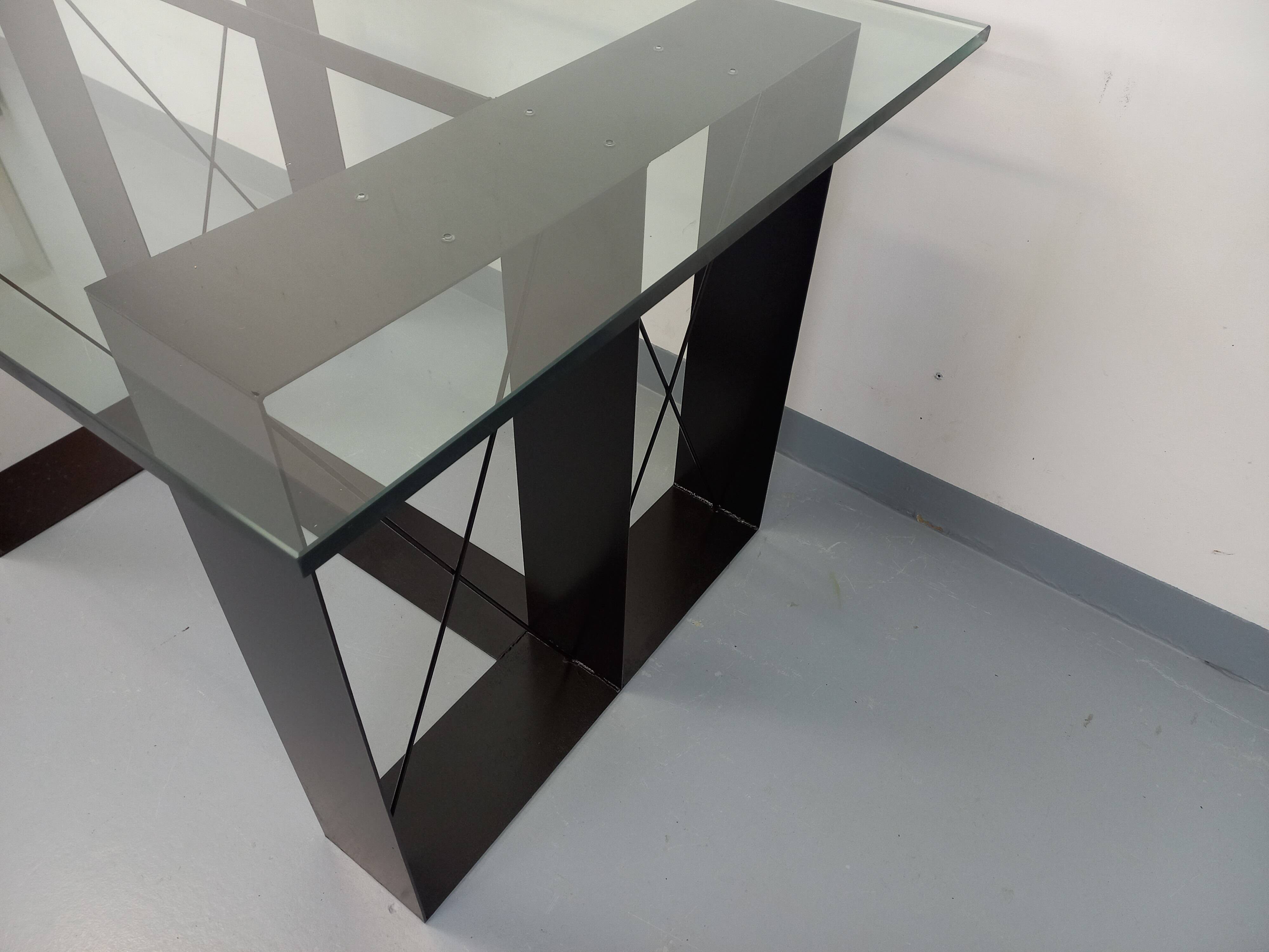 Vintage rectangular high table in glass and black metal from the 1980s.