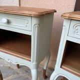 Renovated bedside tables in laurel green and light wood.
