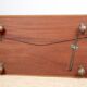 Danish bar cabinet on wheels in rosewood and brass by Jorgen Clausen
