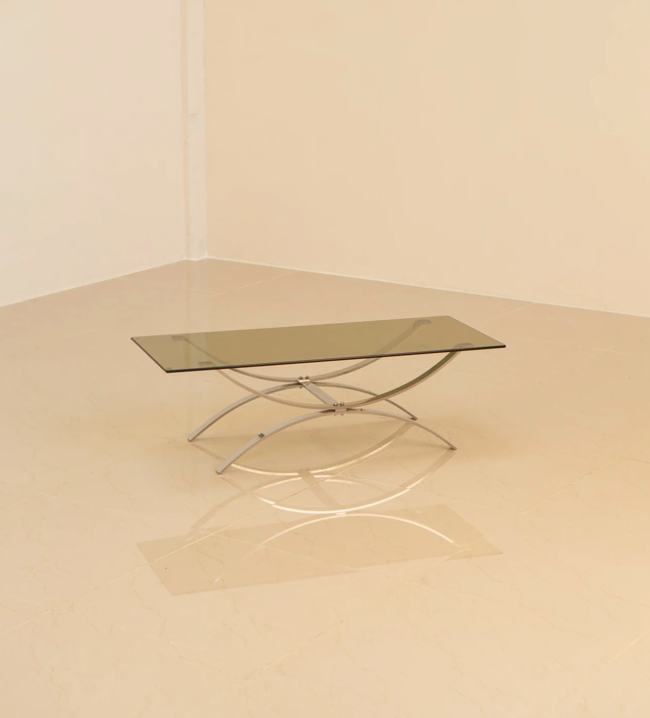 Full metal coffee table and its 70's smoked glass