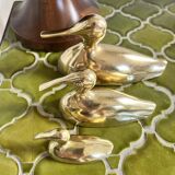 Three brass ducks from the 1950s
