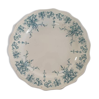 Old flat round service dish in "Moustier" model iron earth from the French factory of Cl