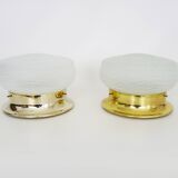Pair of wall or ceiling lights with white-edged globe. 80 years