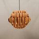 Copper colored hanging lamp. designed by thorsten orrling sweden