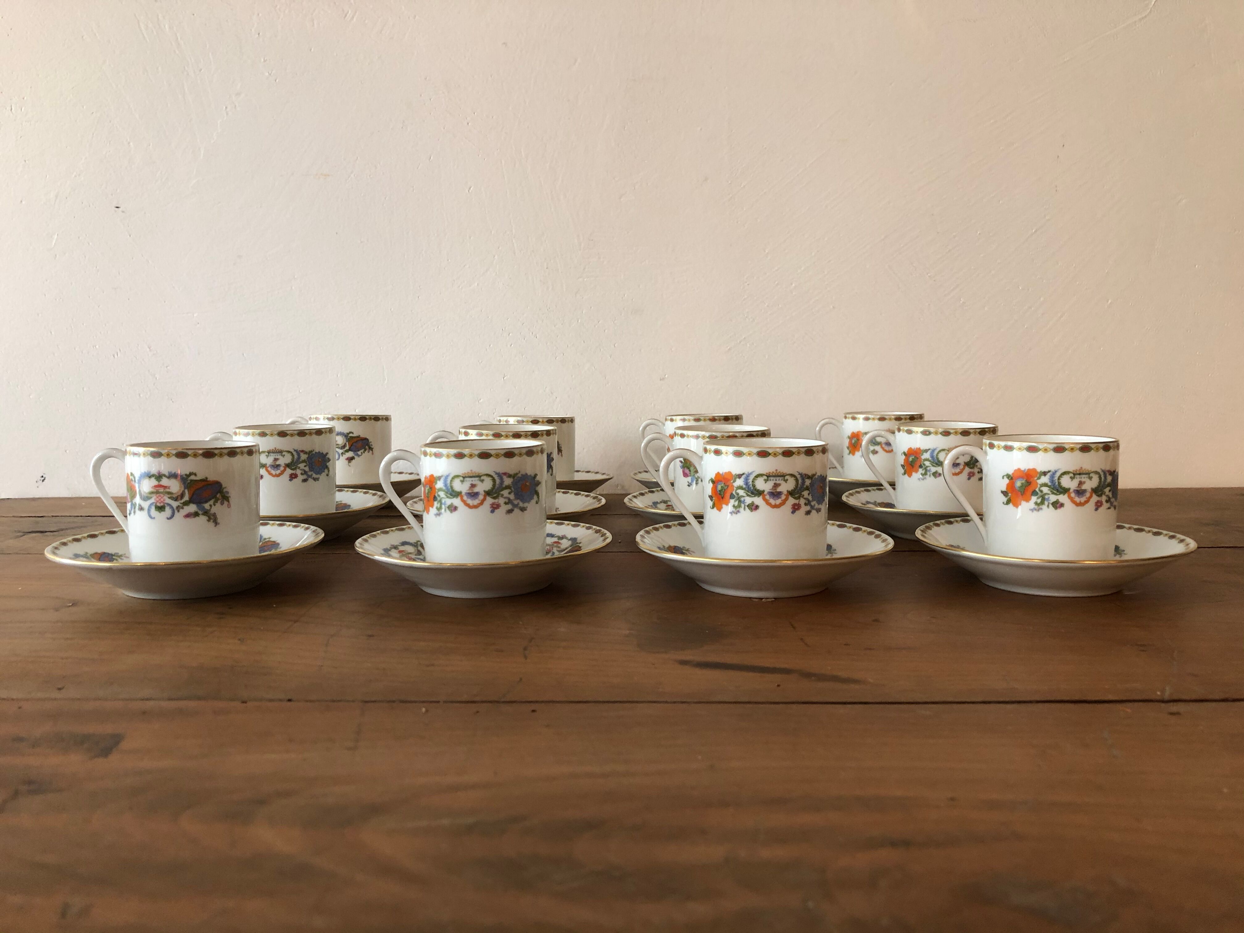 Service of 12 porcelain coffee cups, Raynaud, Limoges, 1950s.