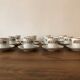 Service of 12 porcelain coffee cups, Raynaud, Limoges, 1950s.