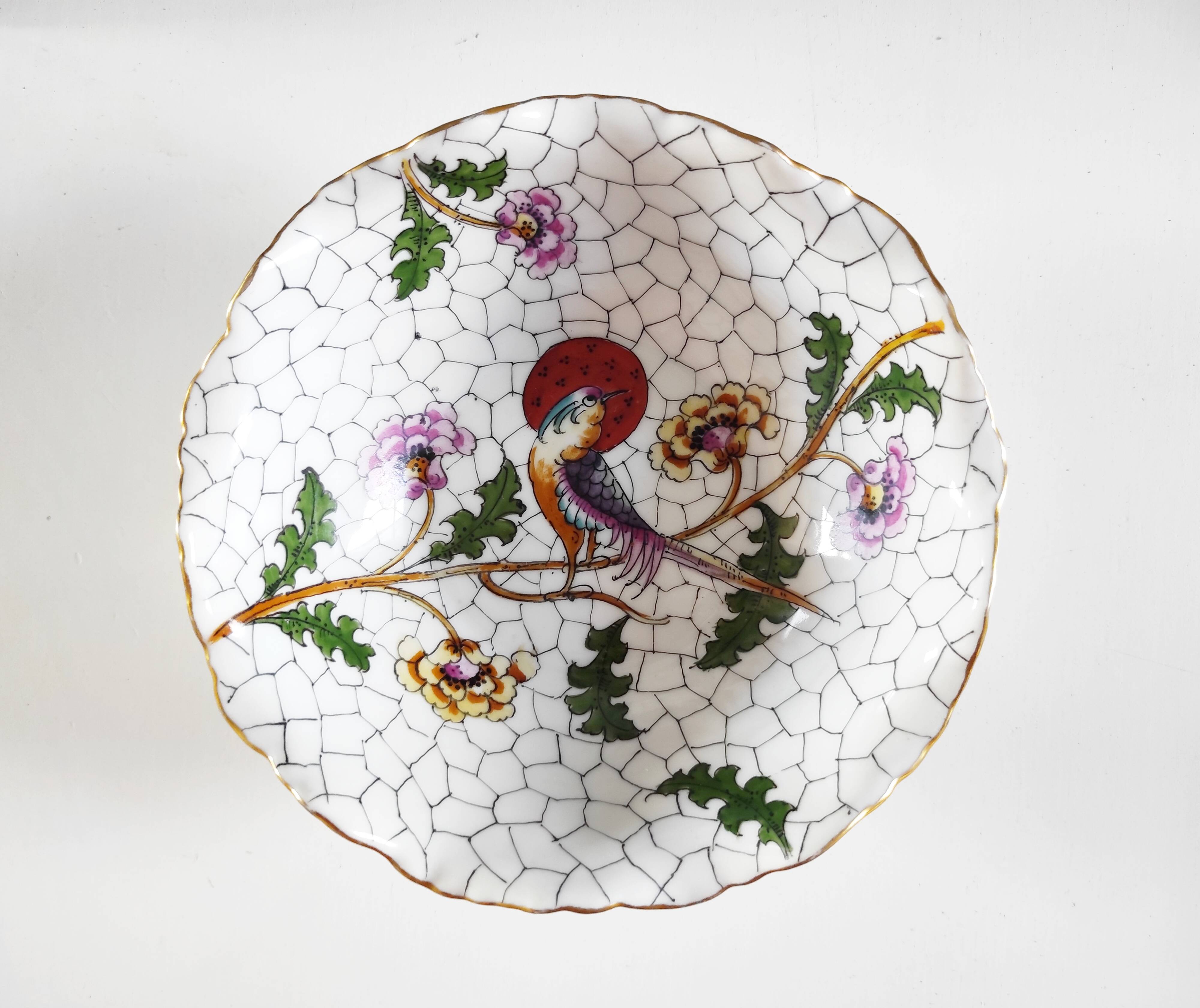 Hand-painted Limoges porcelain bird emptier