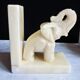 Elephant bookends in alabaster, Pair of elephant bookends.