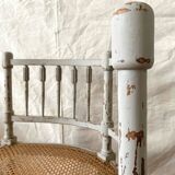 19th-century corner fireplace armchair, wood and cane.