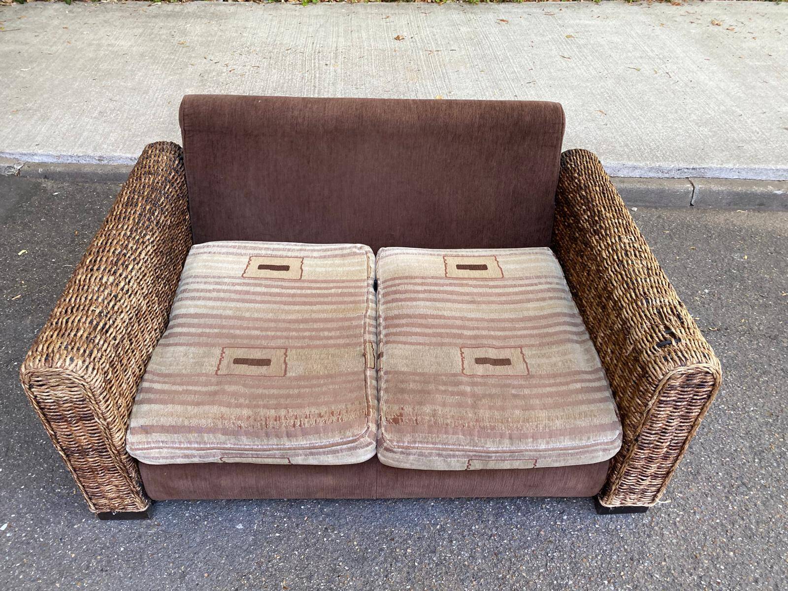 Exotic 2-seater sofa in woven banana tree / rattan and brown fabric.