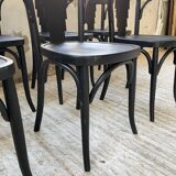 Set of 7 black bistro chairs
