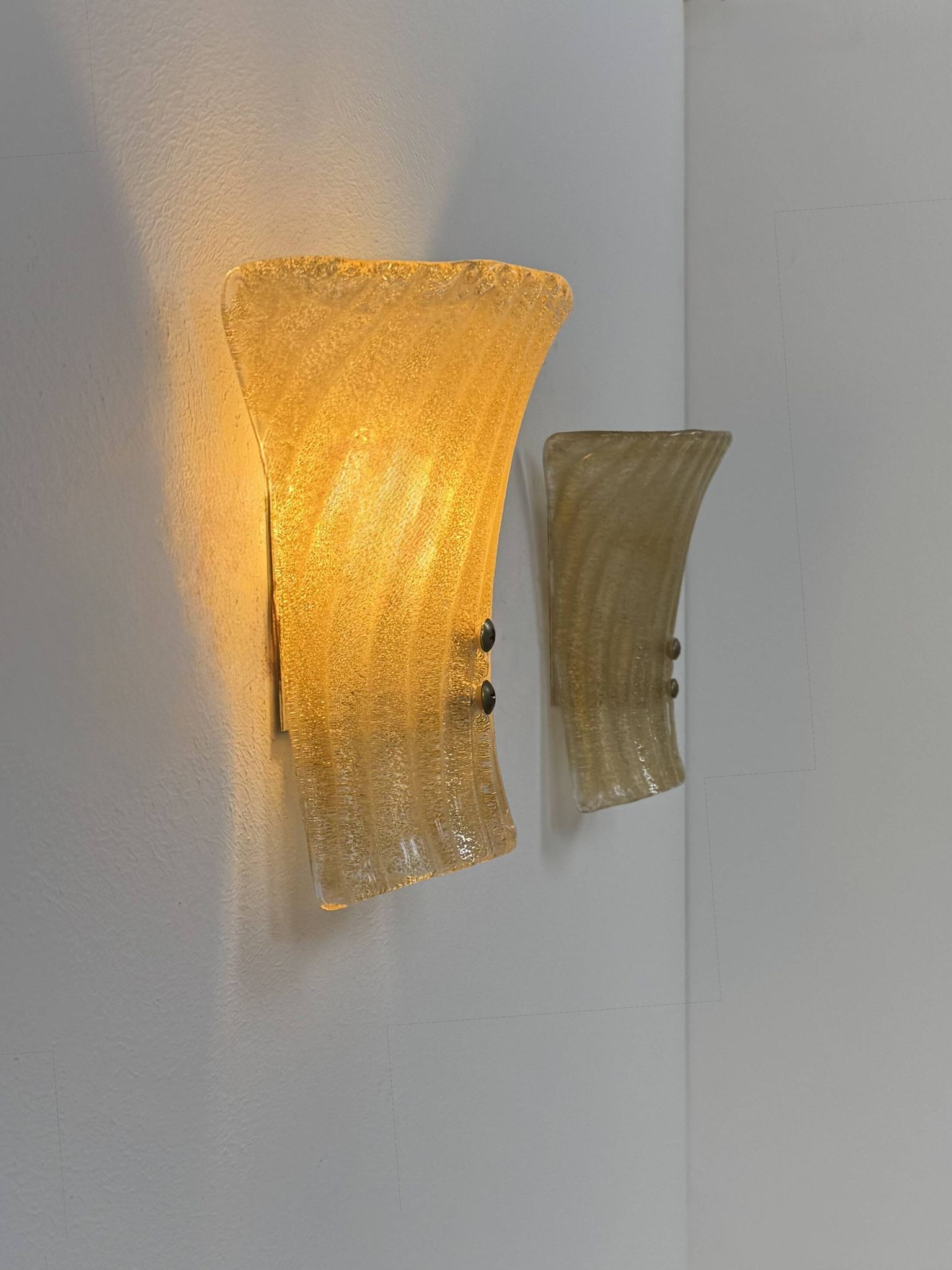 Pair of vintage Murano glass wall lights, pressed moulded, Italy, 1980.