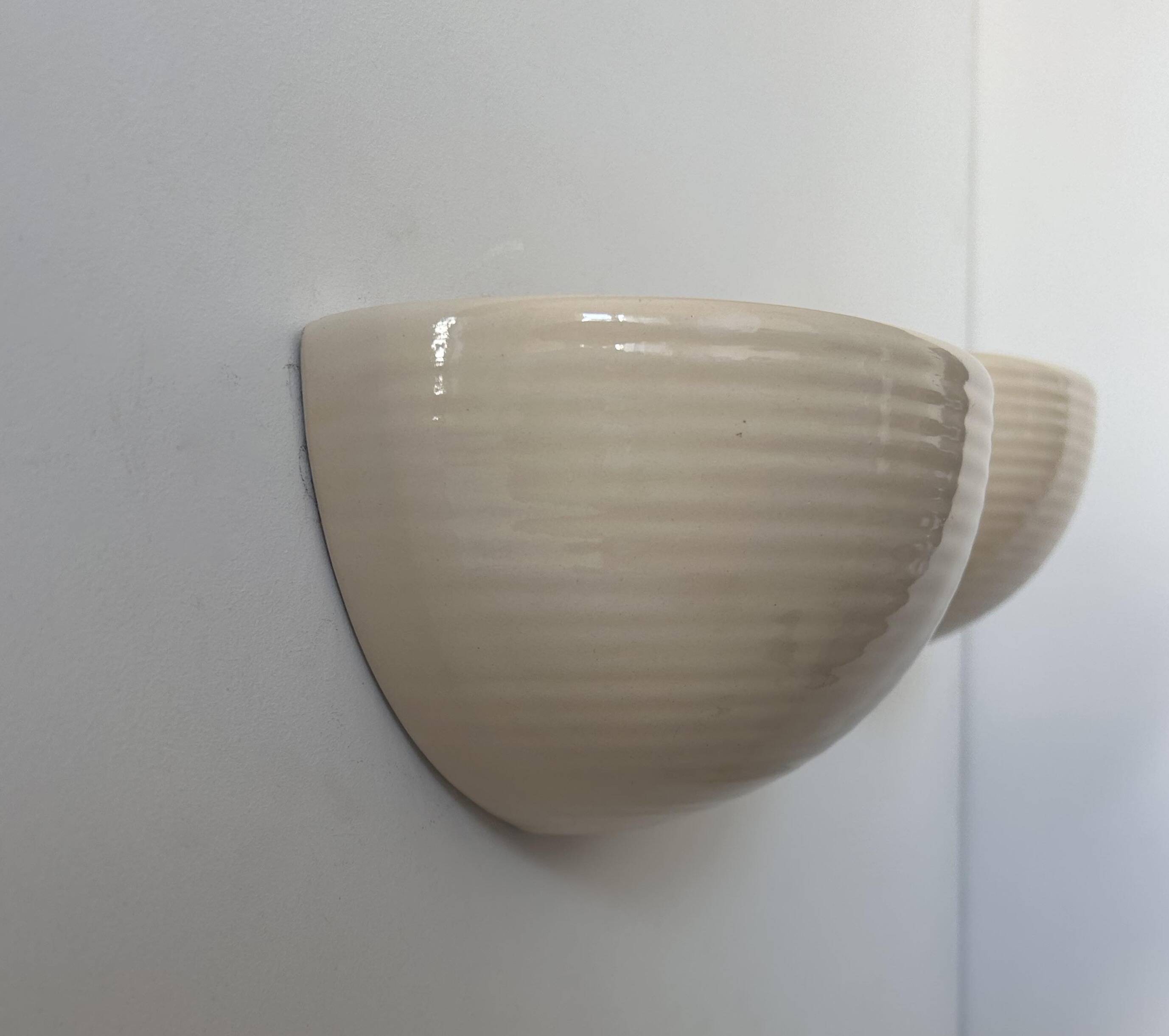 Pair of vintage wall lights, beige porcelain, France 1970