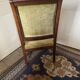 Armchair with a scroll, upholstered in green velvet