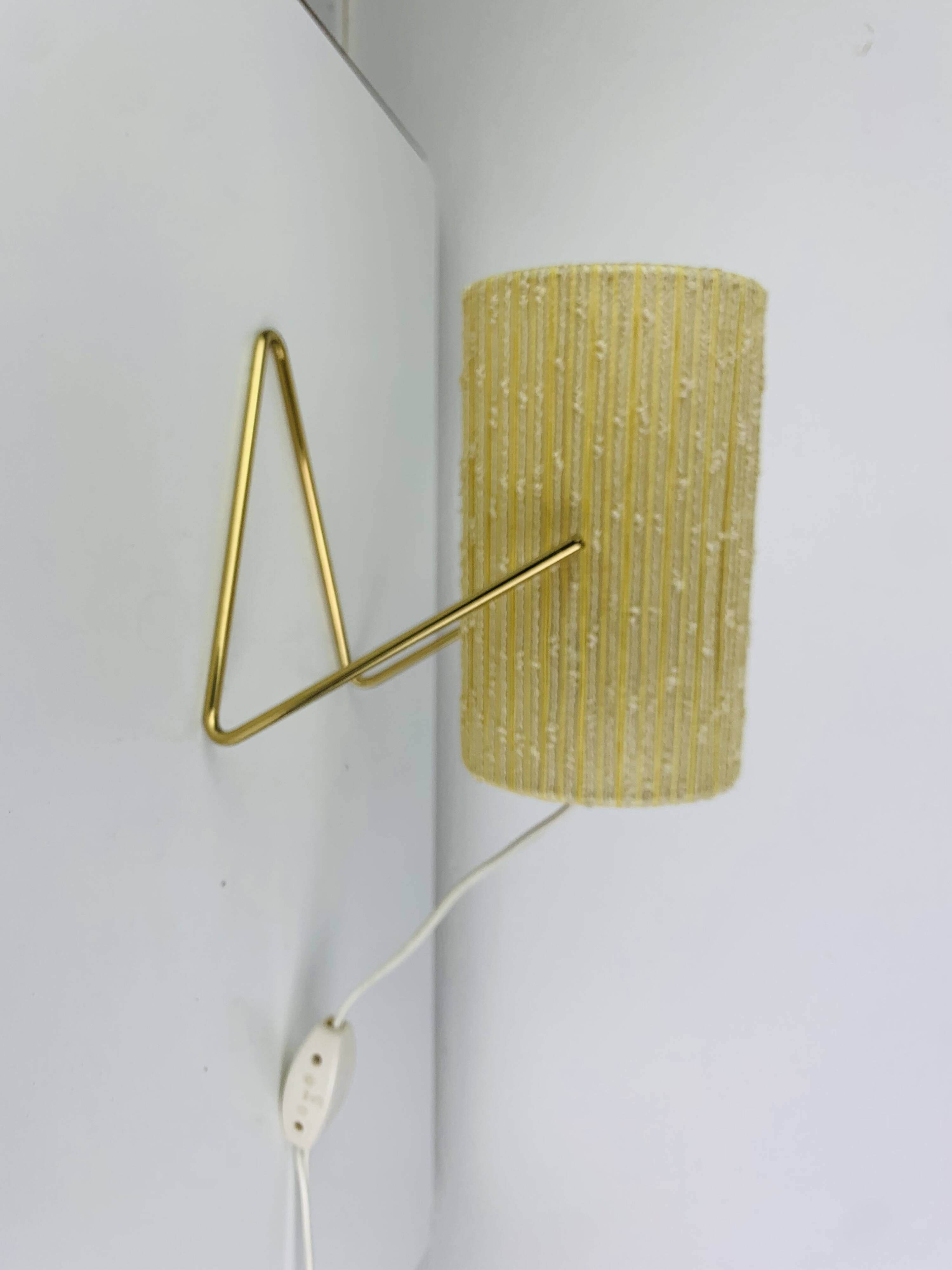 Adjustable lamp or 1950s wall light in brass