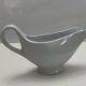 White earthenware saucière