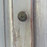 Blue patinated cap cabinet