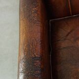 Characterful vintage design armchair made from beautifully patinated sheepskin