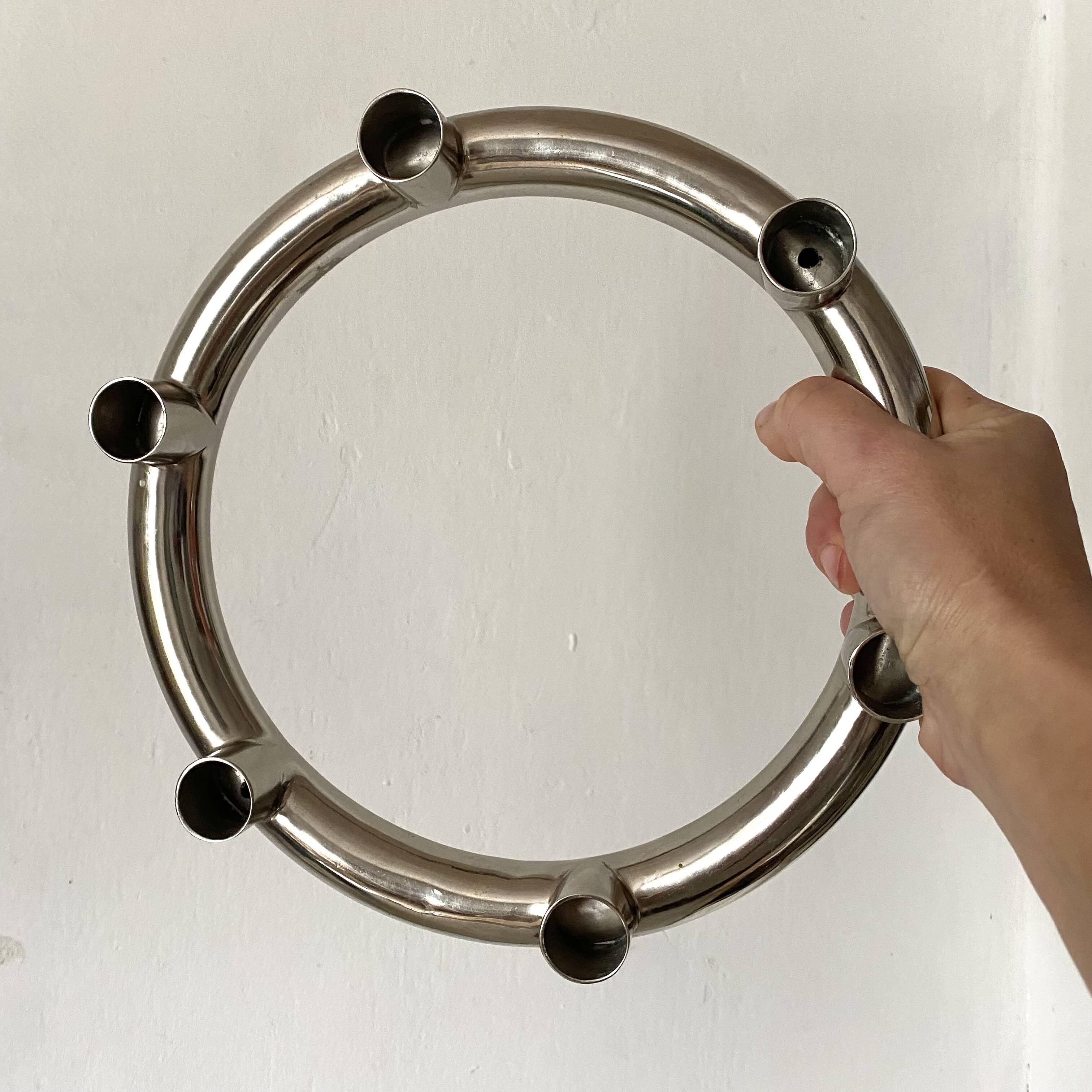 Tubular chrome candle holder