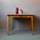 1950s Formica kitchen table with tapered legs and vintage drawer.