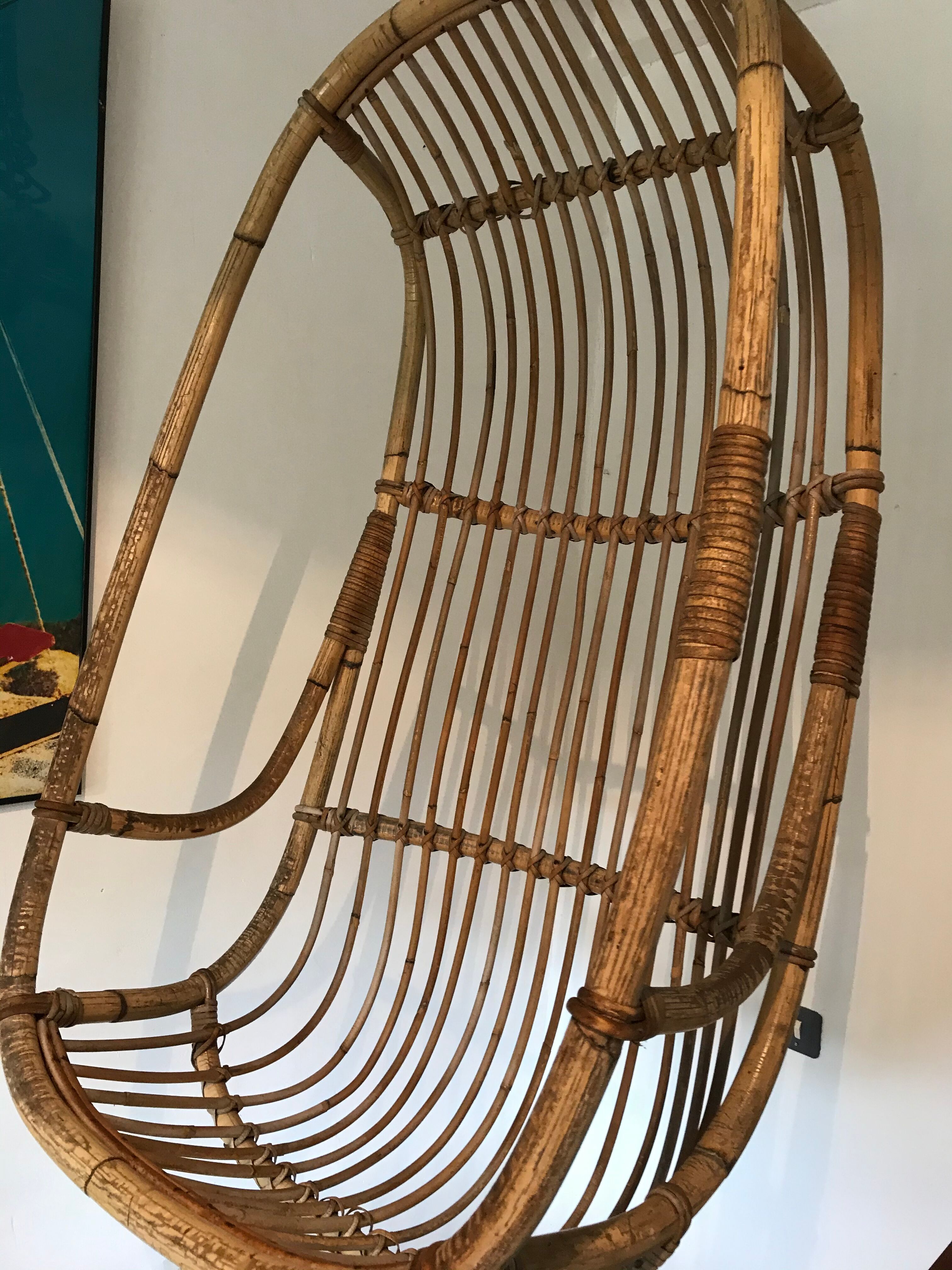 Vintage chair suspended in rattan