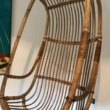 Vintage chair suspended in rattan