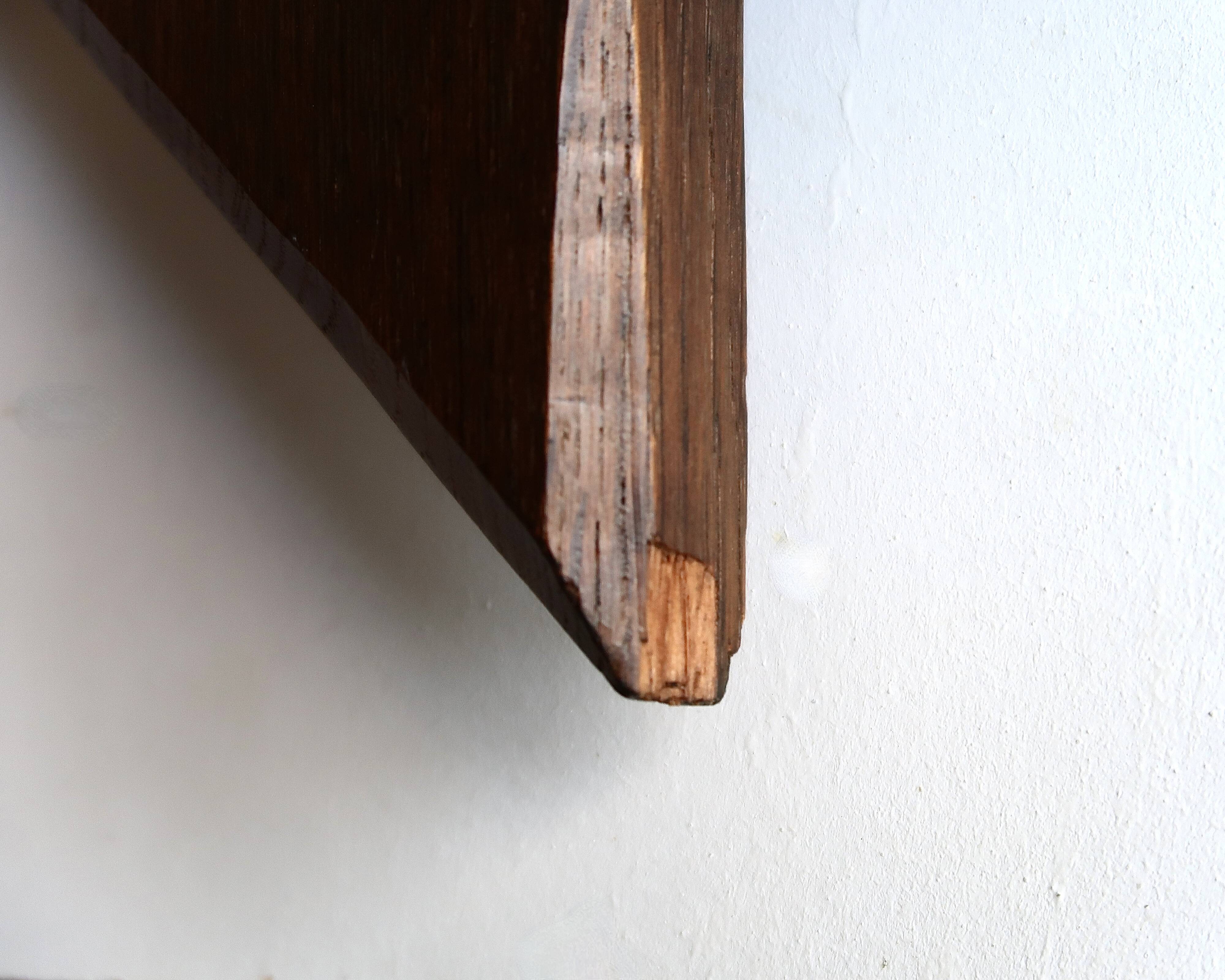 Rectangular mirror with bevelled wooden frame, 1970s.