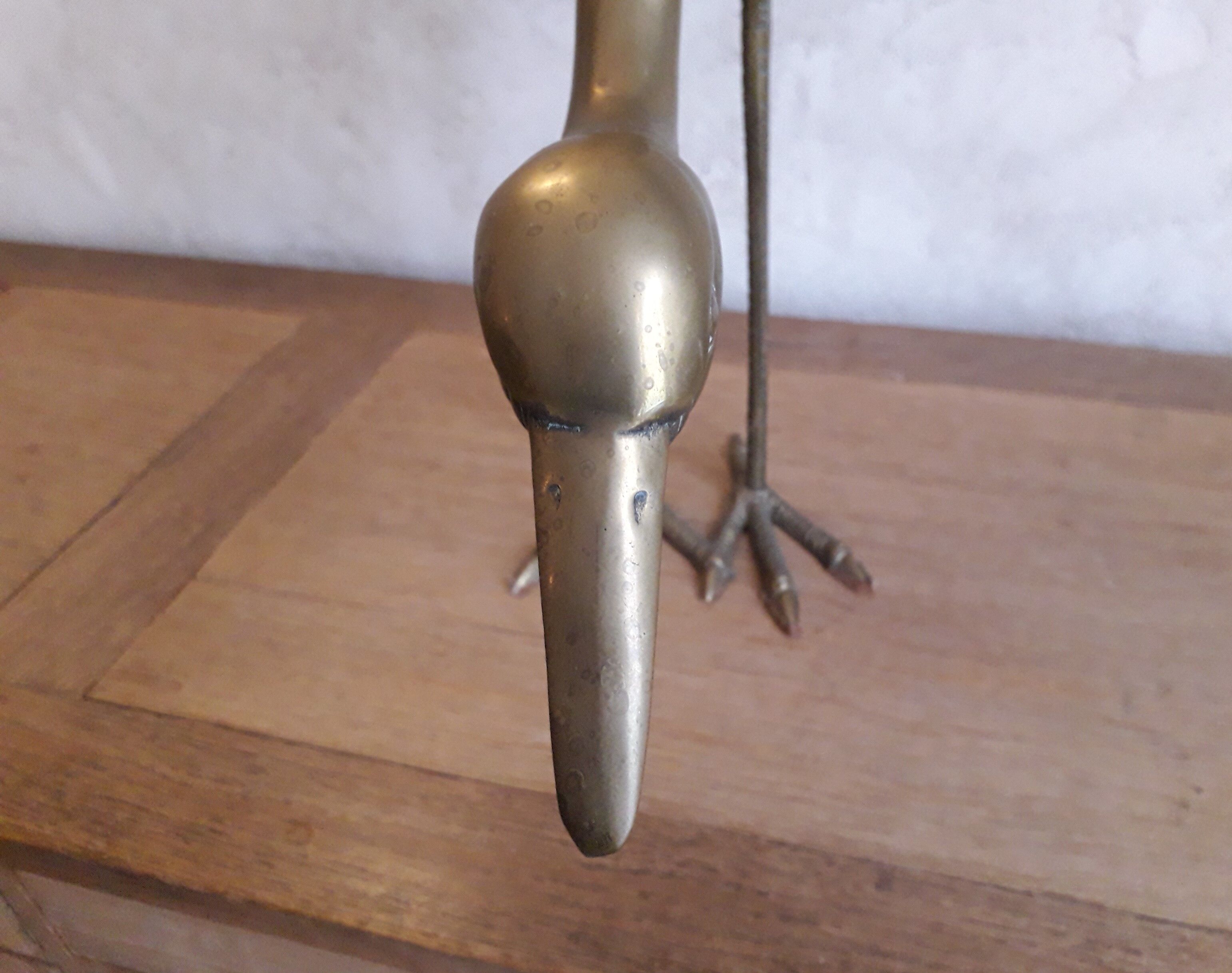 Brass heron