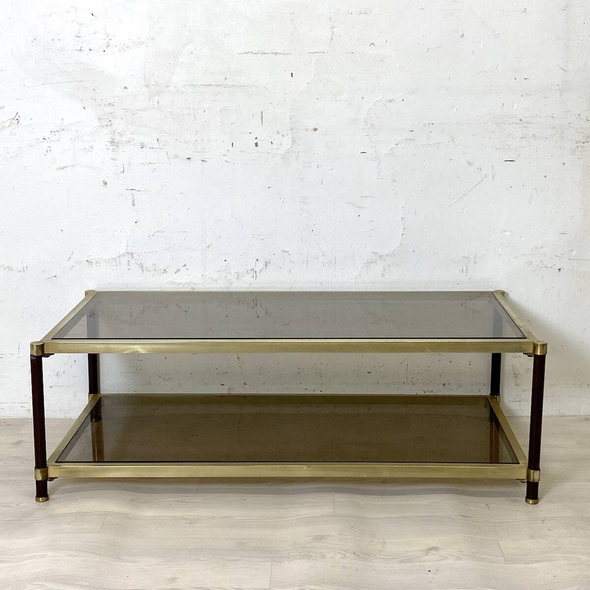 Vintage 1970s gold metal and smoked glass coffee table.