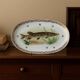 Large French porcelain dish L.C – Painted pike & gilded frieze